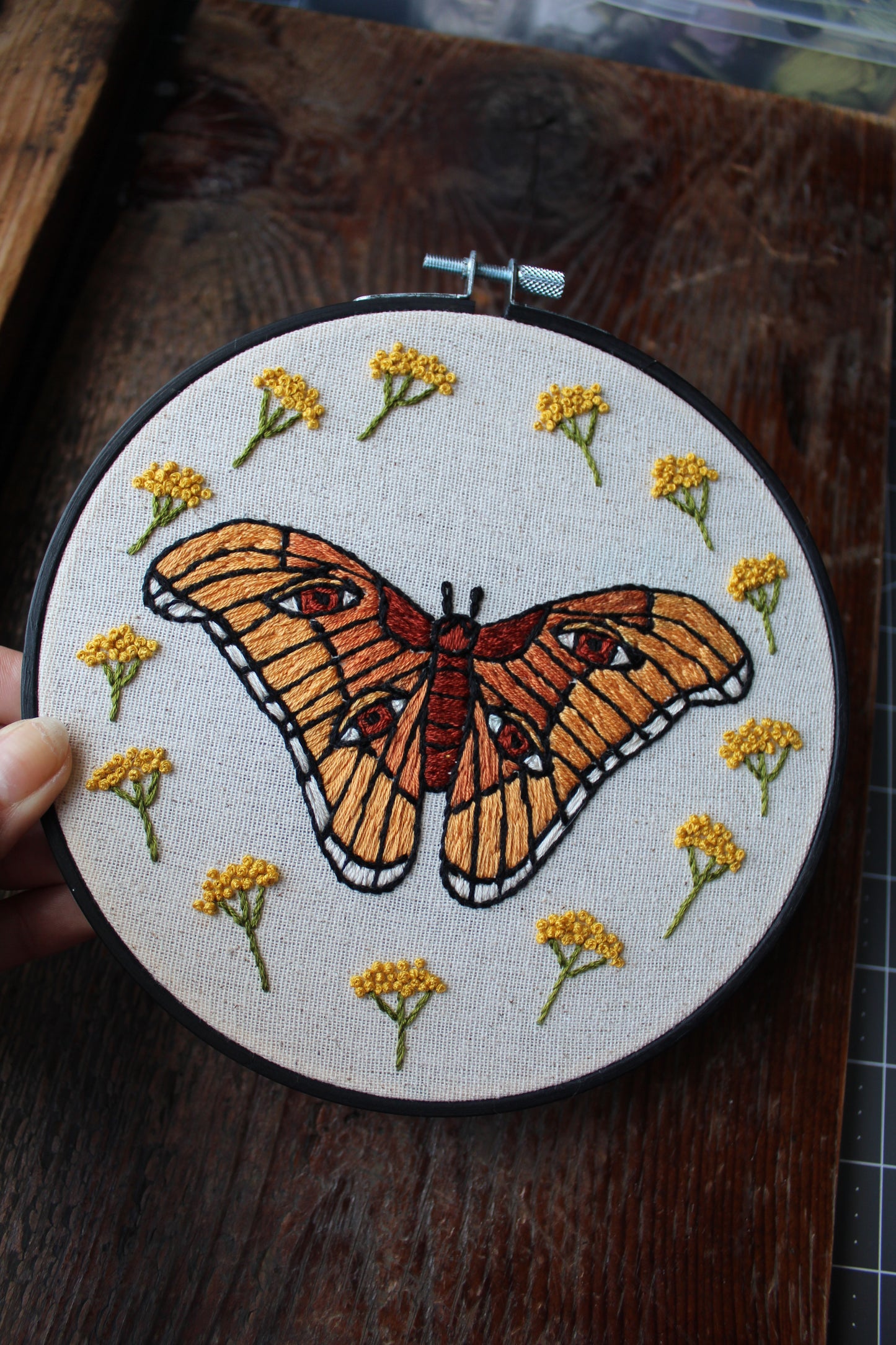 atlas moth embroidery, front held hoop art