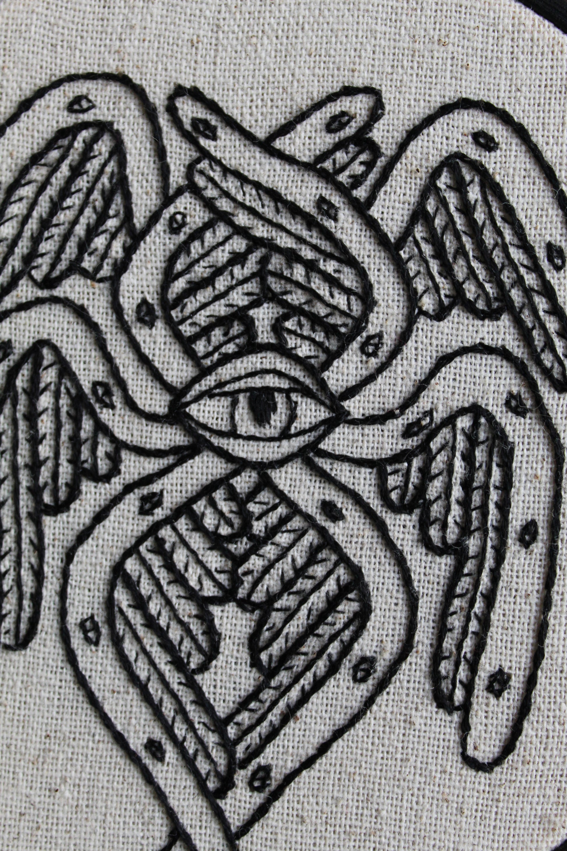 Biblical angel embroidery, close up hoop art